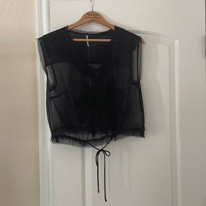 “Free People” sheer crop top with beautiful design on the front.